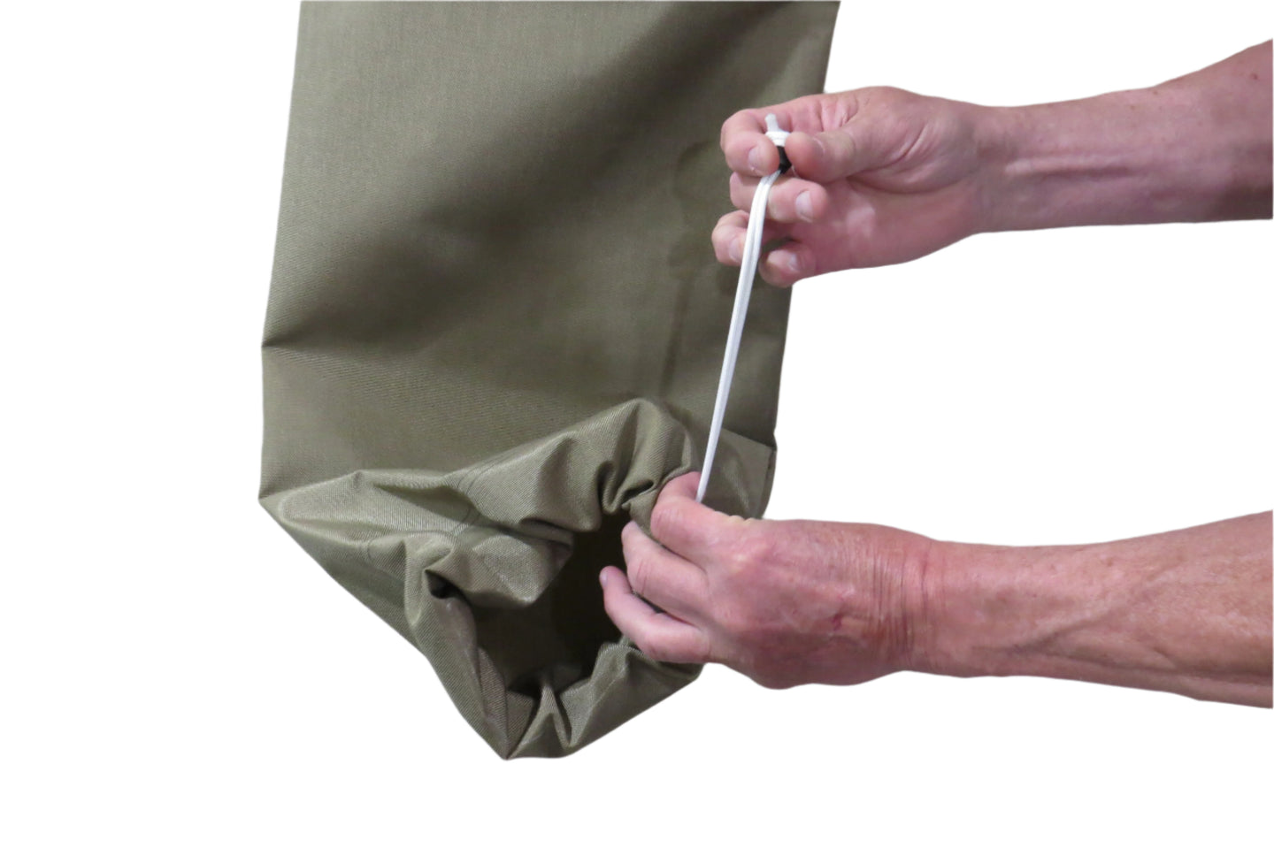 Person closing a Sandstone colored  cover with a white draw string against a white background